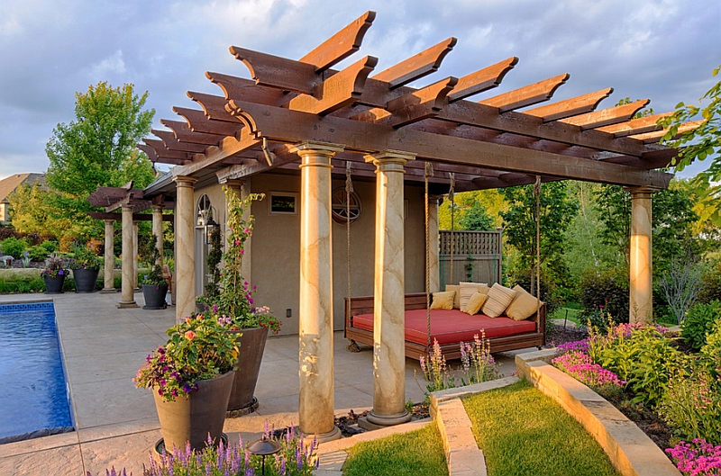 Beautiful Pergola Design Sheltering a Suspended Outdoor Bed by the Swimming Pool by BellaWood Builders