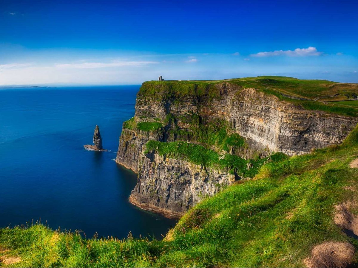 Test your limits and peer out from the edge of the Cliffs of Moher in Ireland.