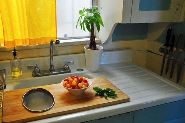 Use an over-the-sink cutting board to expand your counter space temporarily