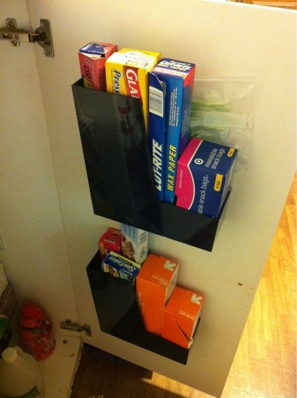 Command strips are the easiest and best route for attaching storage to the inside of your cabinets