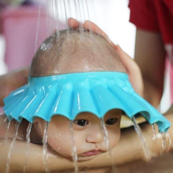 A baby shower cap will make bath time tear-free.