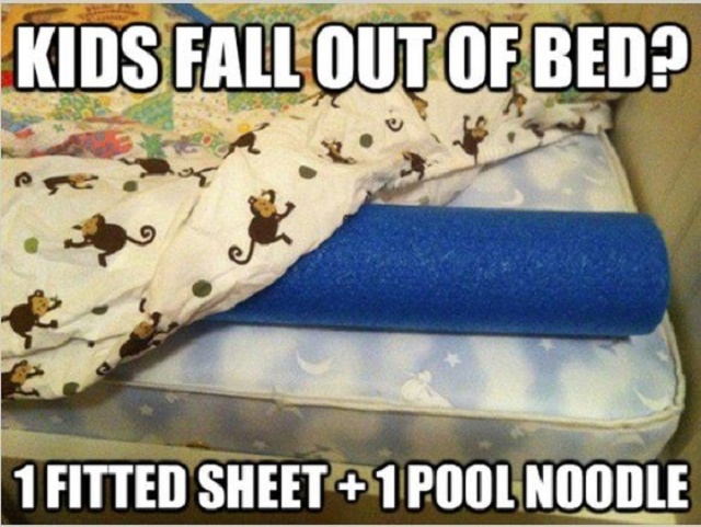 If you're afraid of them falling out at night, create a barrier by putting a pool noodle under a fitted sheet.