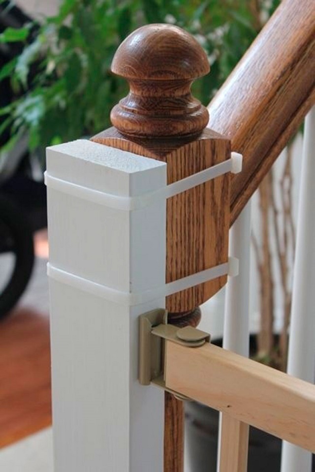 Instead of damaging your home with nails, use a zip tie to secure baby gates to the banister.