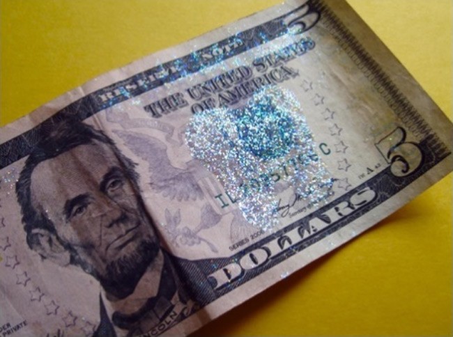 Some glue and glitter can turn any money into "tooth fairy money."