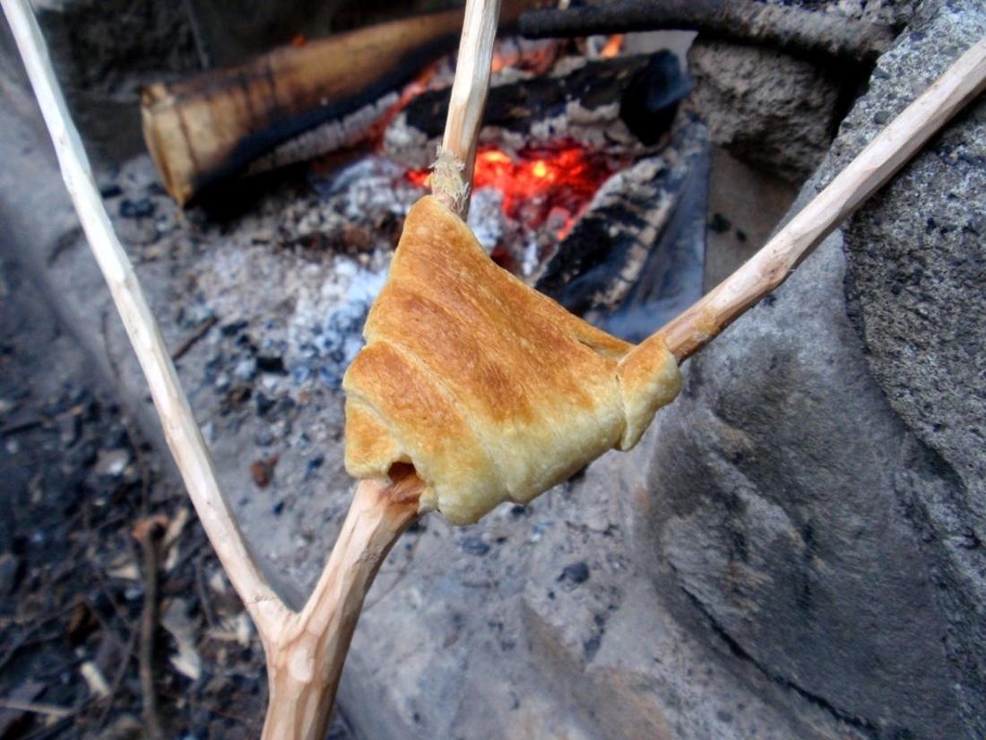 Make crescent rolls over the campfire.