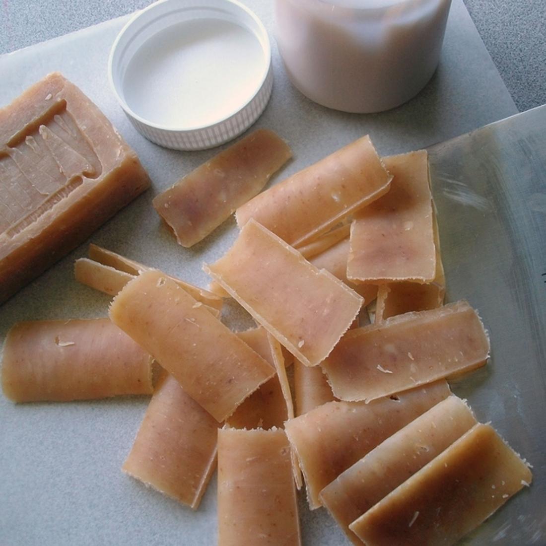 Make single-use soap leaves from a bar of soap and a vegetable peeler.