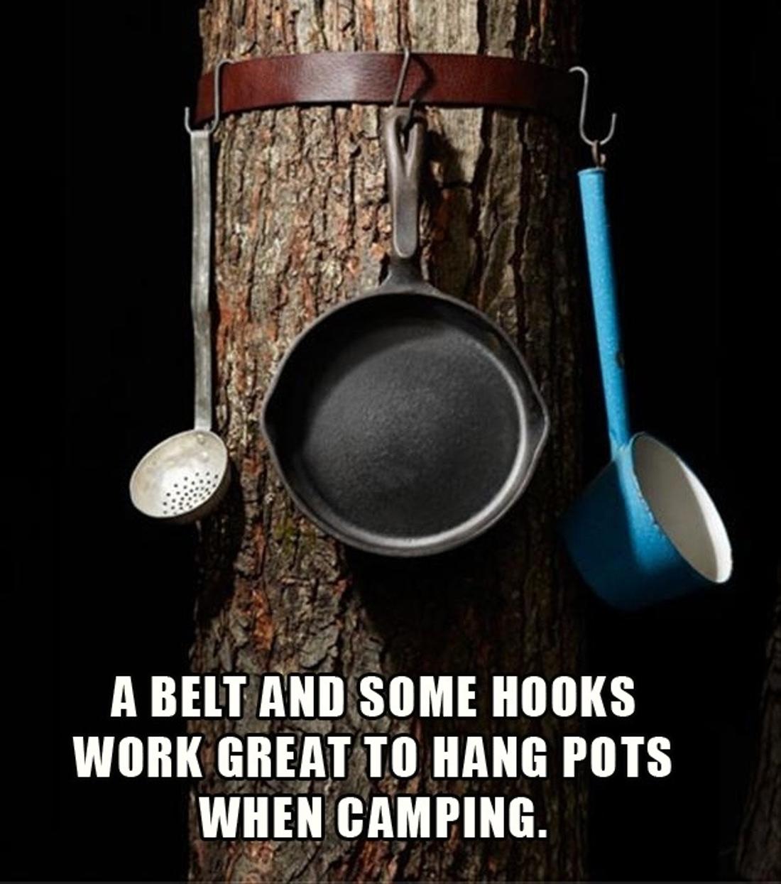 Use a belt and hooks to hang up pots and pans.