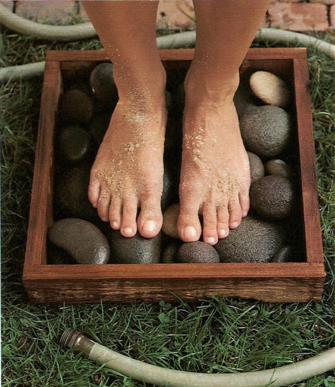 Rinse your dirty feet off in a waterproof frame filled with flat stones.