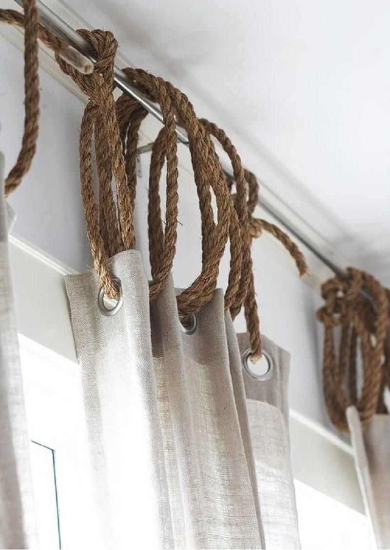 Jute rope is a cheap way to add a rustic/nautical touch to any window dressing.