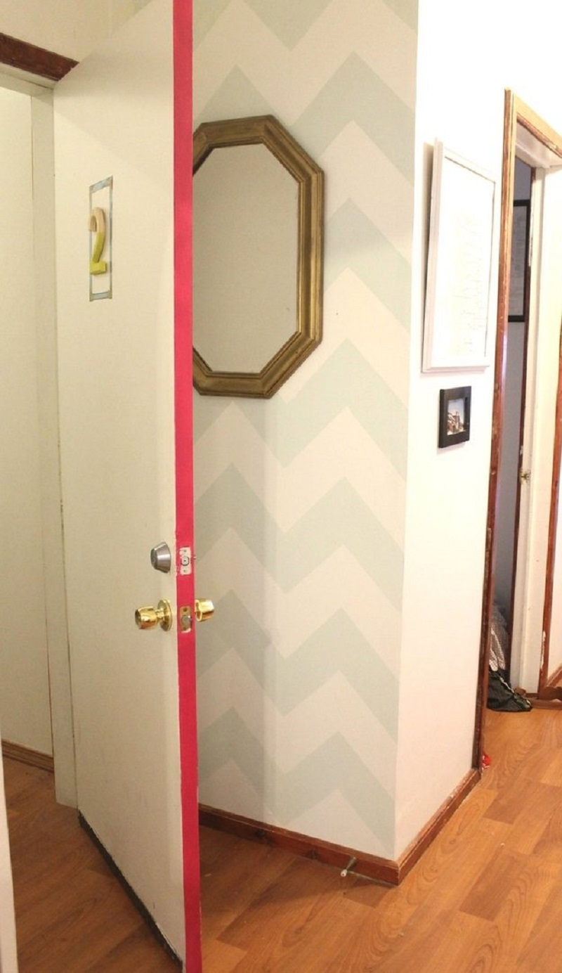 If you’re looking for a subtle pop of color, paint the sides of your door.