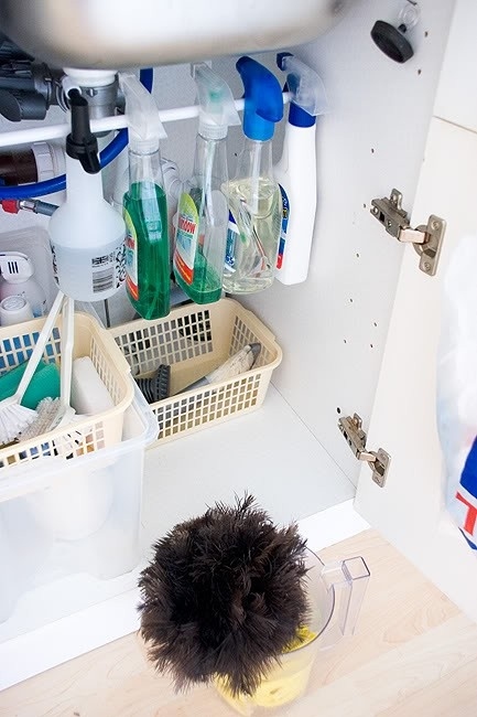 Use A Rail In Your Sink Cabinet For Cleaning Products