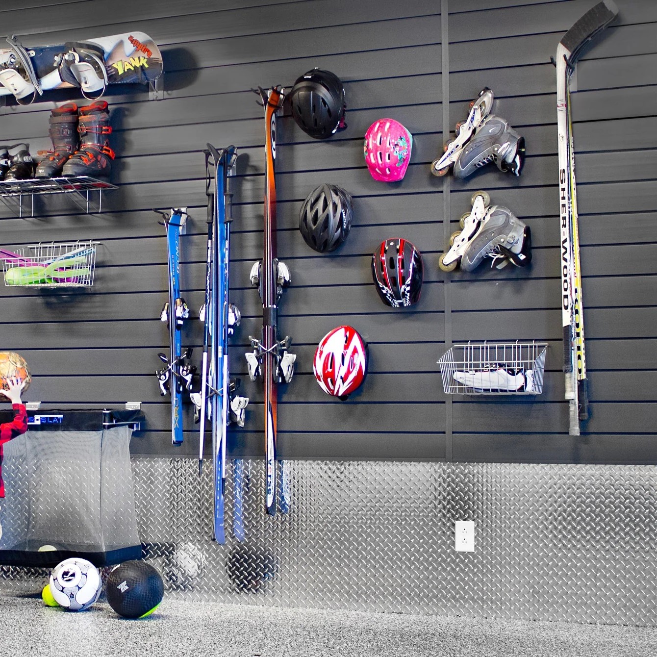 Hang A Pegboard With Movable Hooks To Organize Kids’ Sports Gear