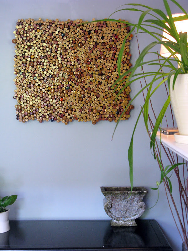 Save Your Wine Corks And Glue Them Together To Create A DIY Cork Board.