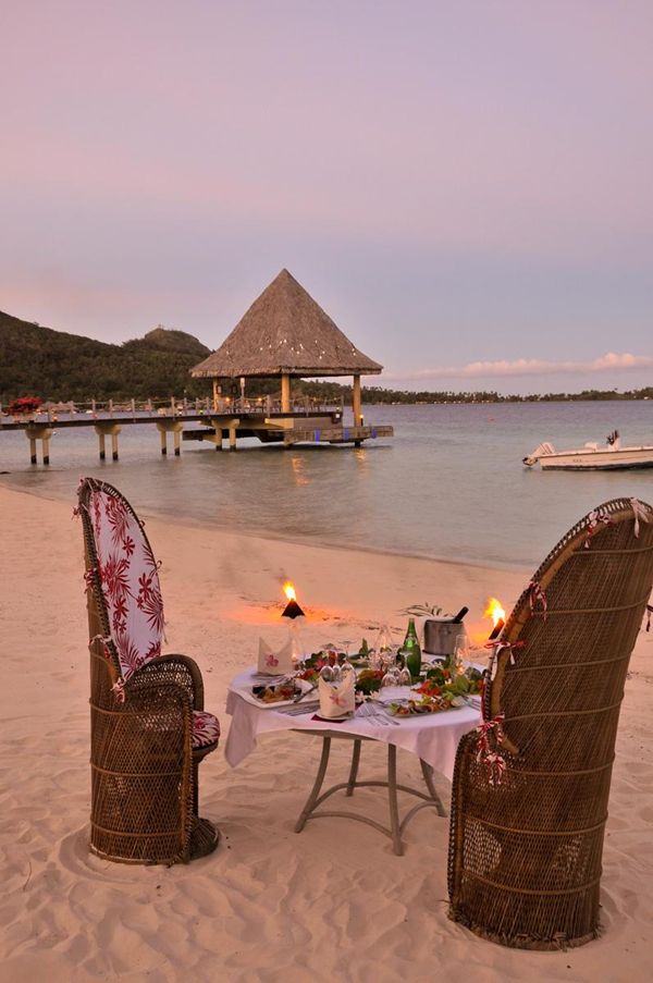 Candle-lit beach dinner by the lagoon