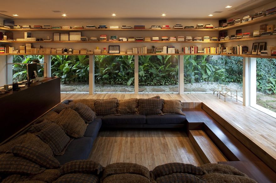 Lowered Reading Room With Glass Walls