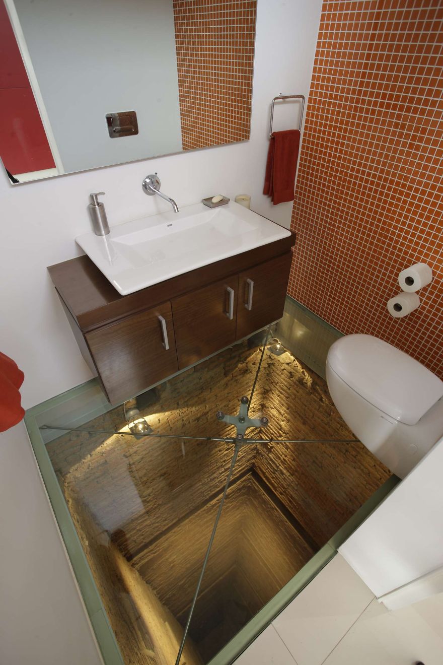 Glass Floor Over Open Shaft In Bathroom