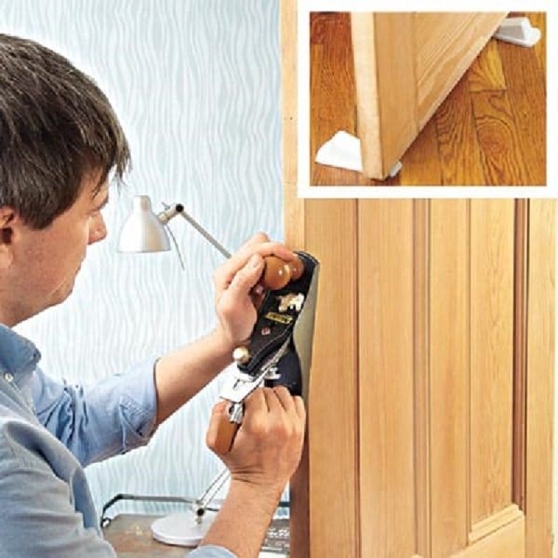 Using A Planer, Shave Off A Small Amount From A Wooden Door Edge To Leave Enough Room For Contracting And Expanding During Hot And Cold Weather.