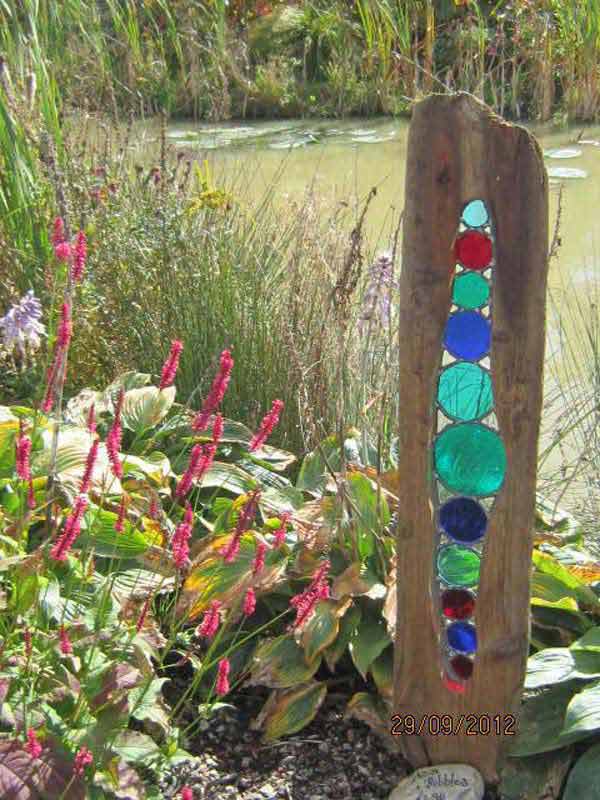 Driftwood And Colored Glass Garden Sculpture:
