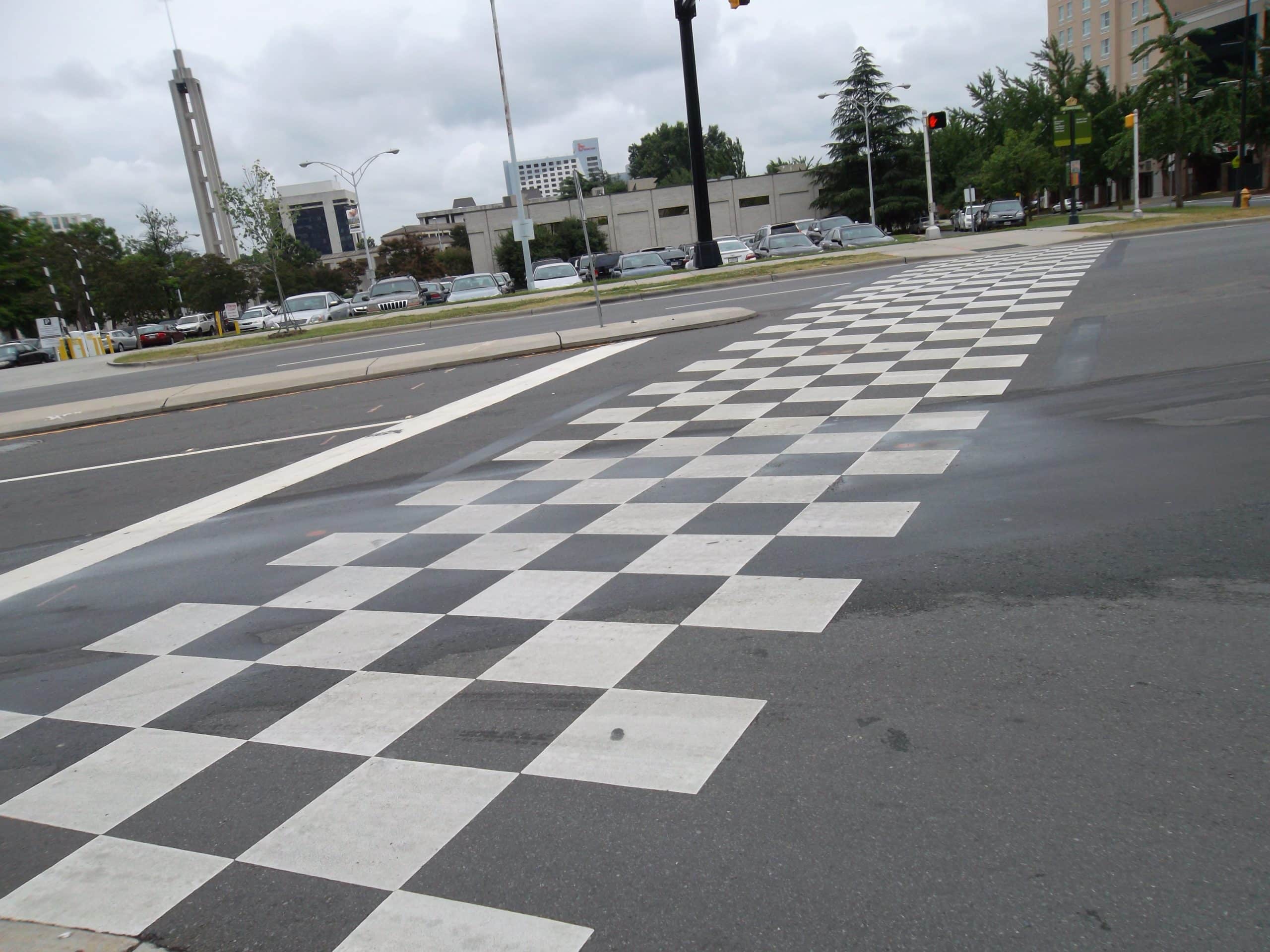 A Checkered Flag Crosswalk In From Of The Charlotte NASCAR Hall OF Fame