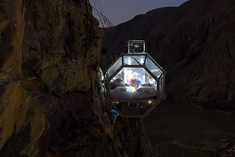 Terrifying See-Through Sleeping Capsules Hang 400 Feet Above Peru’s Sacred Valley