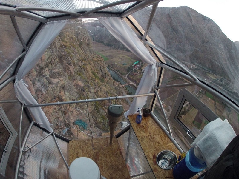 Terrifying See-Through Sleeping Capsules Hang 400 Feet Above Peru’s Sacred Valley