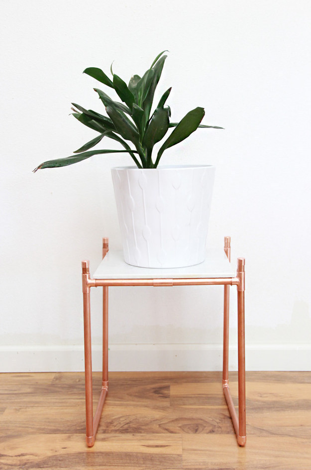 Balance A Marble Tile On A Copper Pipe Frame For A Pretty Plant Stand.