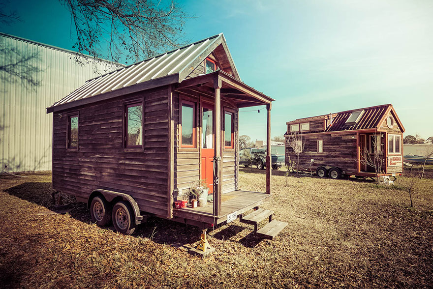 Art parks his 117 sq ft tiny home behind his rock climbing gym in Louisiana