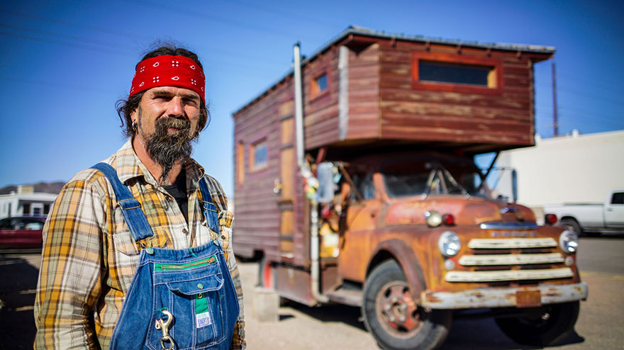 Nomadic John built his house on top of an antique firetruck