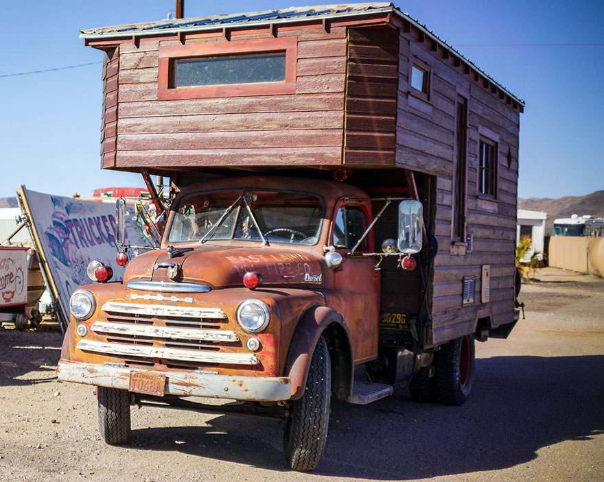 Nomadic John built his house on top of an antique firetruck