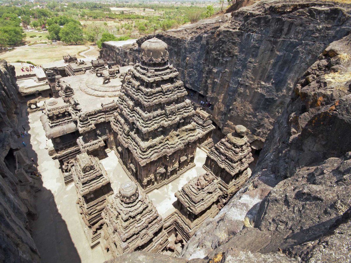 Thirty-four monasteries and temples built into the wall of a basalt cliff make up the Ellora Caves in Maharashtra, India. The impressive site dates back to 600-1,000 A.D. and pays homage to Buddhism, Hinduism, and Jainism.
