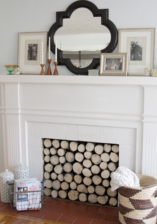 Faux Log Displays Make The Room Cozier.