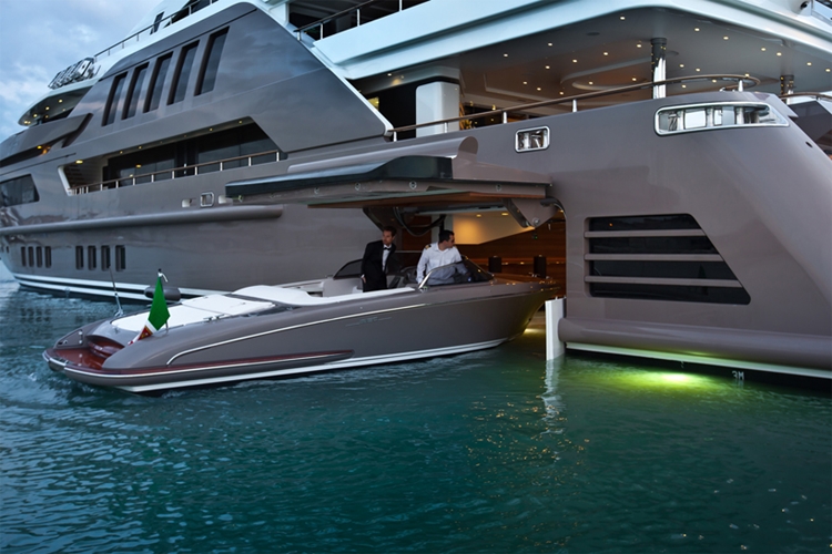 A Super Yacht With Its Own Garage For A Speedboat.