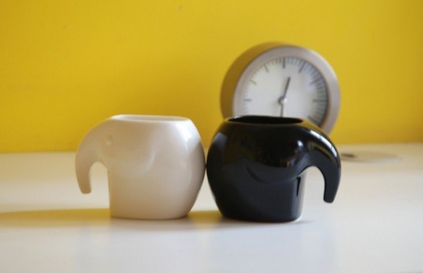 These elephant mugs come in three sets with the trunk as a handle.