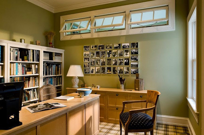 This Is A Rather Traditional Way Of Displaying Photos. This Is A Home Office, And It Features A Portion Of The Wall That Was Covered With Pictures Of The Same Size, Shape, And Type. It’s An Excellent Way Of Adding A Personal Touch To Your Working Space.