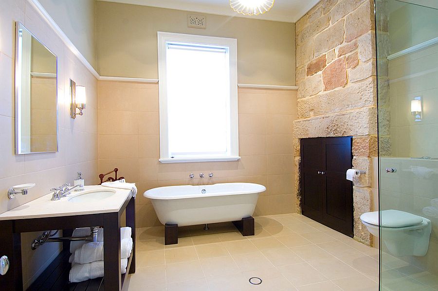 15-AD-Exposed-stone-inside-the-renovated-bathroom-adds-old-world-charm