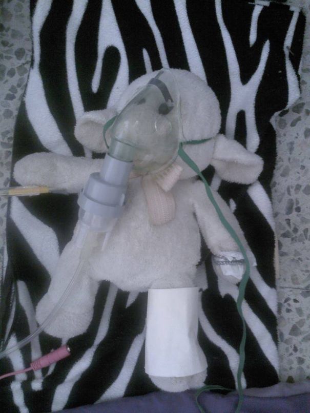 My 8-Year-Old, Adriana, Was Taking Care Of Her Toy, Who "had Been In An Accident."