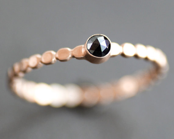 This black diamond and rose gold pebble band: