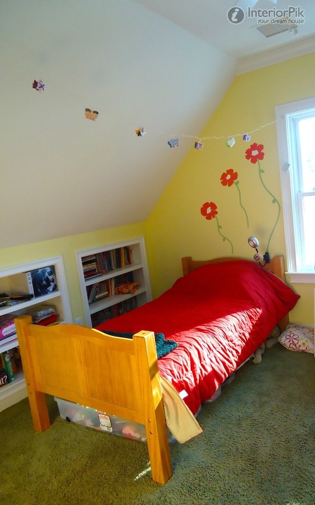 Kids Room With White Wall Hanging Book Shelves & White Sloping Ceiling