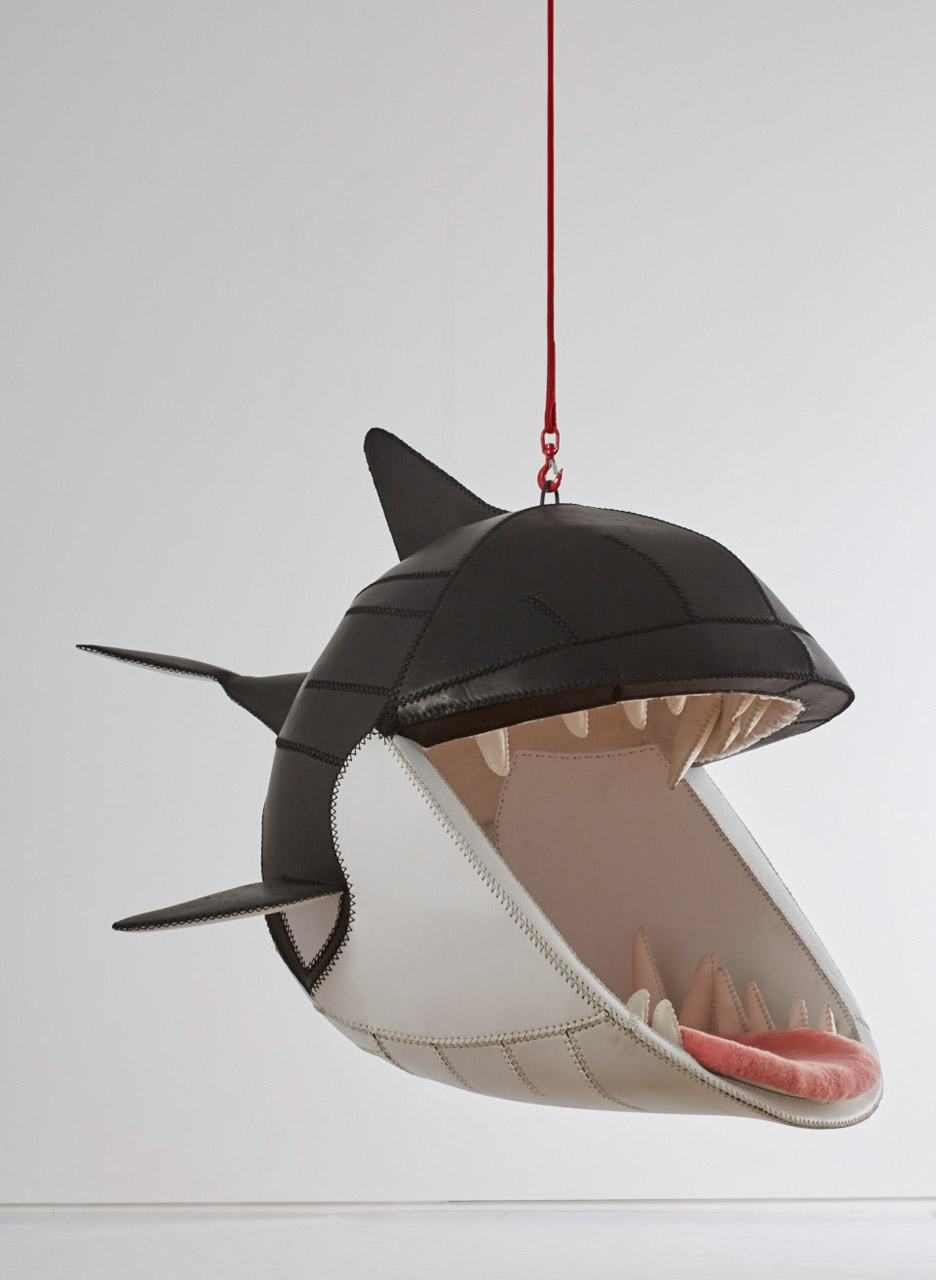 AD-These-Hanging-Chairs-Let-You-Sit-In-The-Mouths-Of-Animals-03