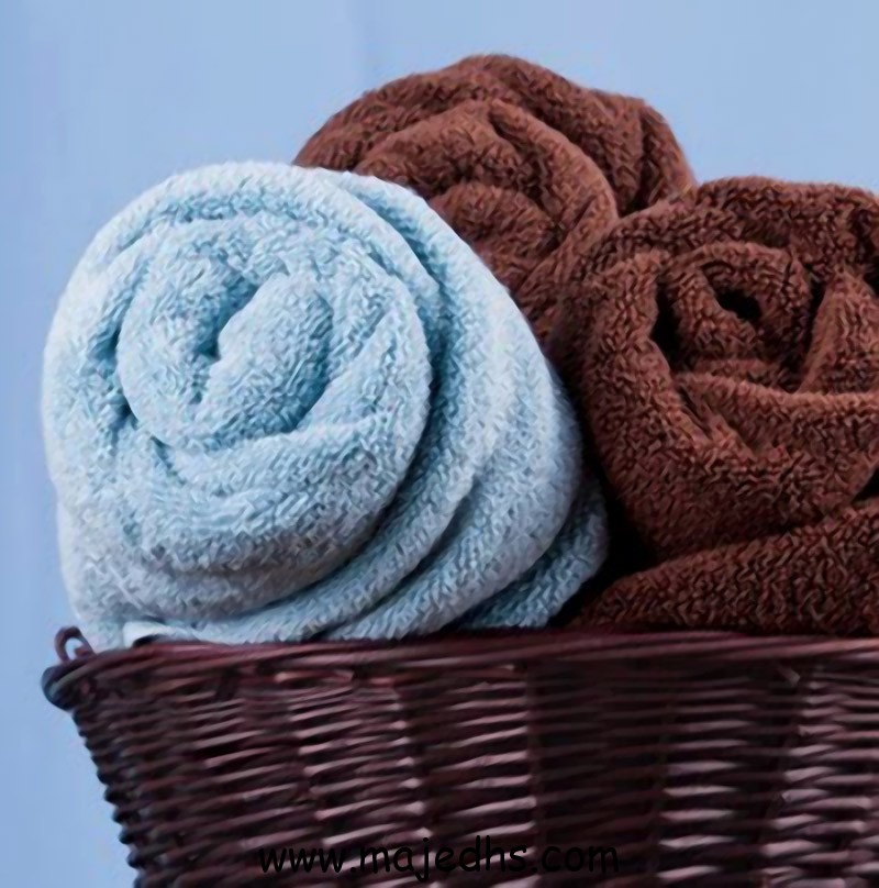 Instead Of Folding Your Bath Towels, Try Rolling Them To Save Storage Space