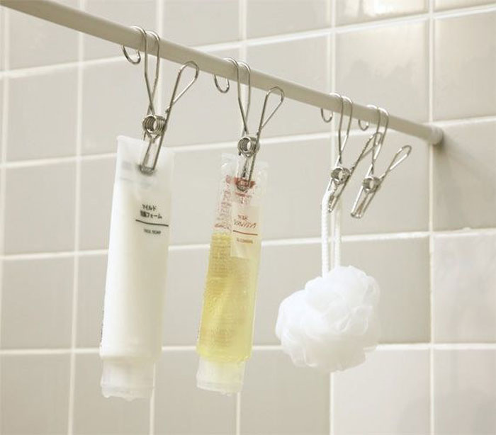 Add Hooks On A Shower Rod To Hang Bath Supplies