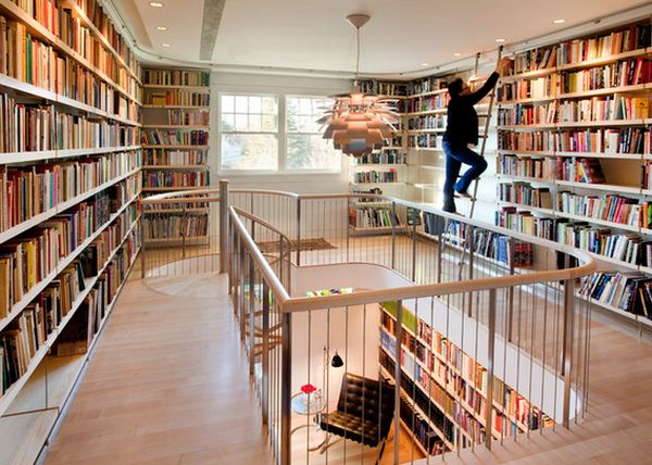 Use the staircase walls as bookcases and you’ll get a unique library design