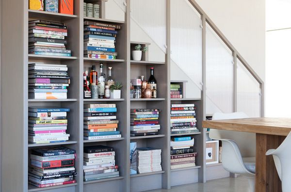 Cubbies built into the staircase wall can be perfect for storing and displaying books