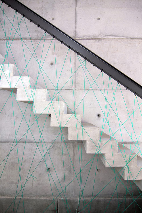 Concrete Stairs With Cord Crisscrossing By MO Architekten