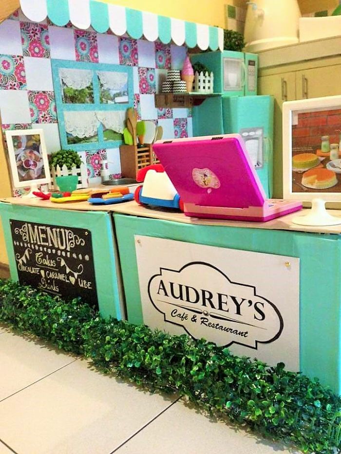 She printed out a signage “Audrey’s Cafe & Restaurant” made from an illustration board and pasted it using glue