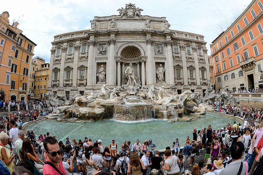 Admiring The Trevi Fountain In Rome, Italy