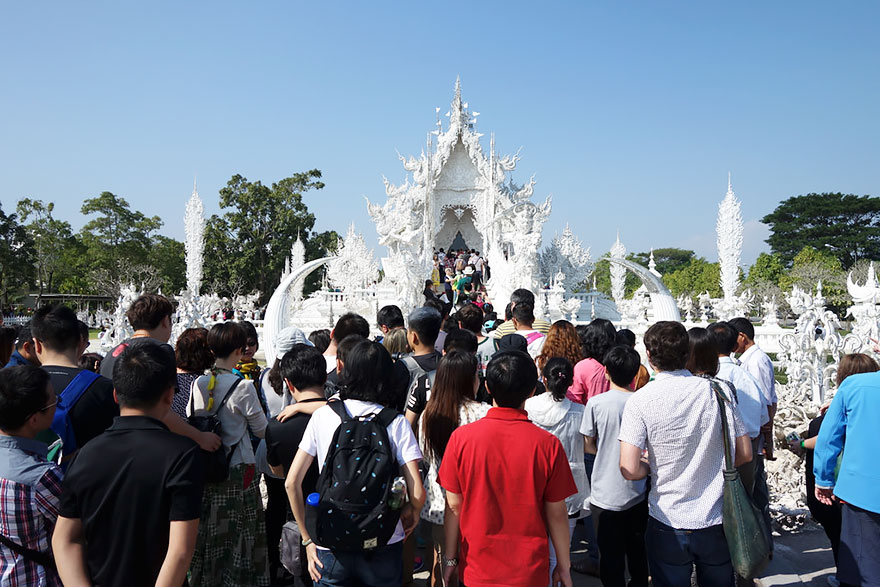 Admiring Wat Rong Khun Temple In Thailand