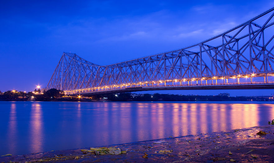 Walking By The Howrah Bridge In Kolkata, India