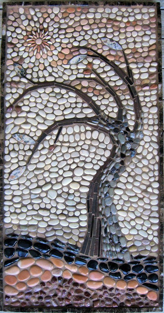 Leafless Tree Amid Mosaic Pebbles