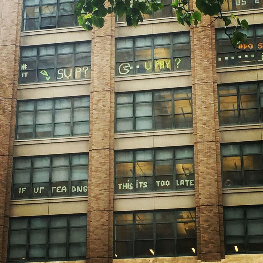 Soon, “Sup” appeared on a building from across the street at 200 Hudson